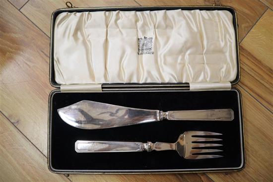 A part canteen of plated cutlery, oak cased; a pair of plated fish servers and a set of six plated fish knives and forks (both cased)